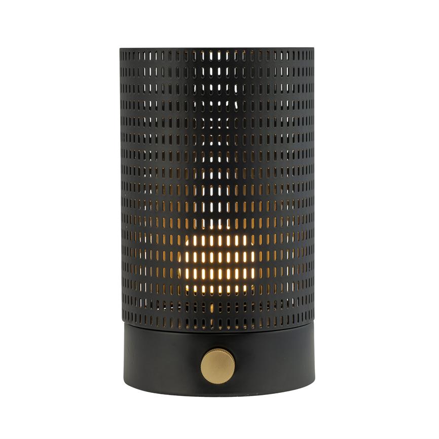 Cylindrisk perforeret bordlampe i sort metal med gylden drejeknap, udsender varmt, priklignende lys gennem rektangulære huller; placeret isoleret mod hvid baggrund.