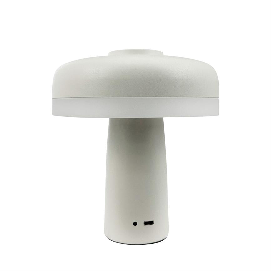 En hvid svampeformet bordlampe står centralt; den har en cylindrisk fod, rund skærm og synlige porte (USB‑C og lille indikatorhul) mod en ensartet hvid baggrund.
