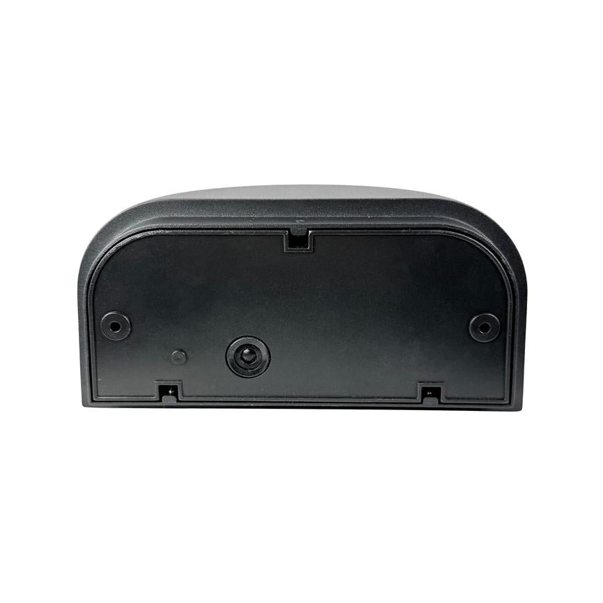 Sort plastmodul ligger fladt; frontplade med tre runde åbninger/skruehuller og et centralt indstik, placeret på en ensartet hvid baggrund.